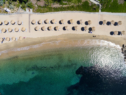 Eagles Resort Chalkidiki sandy beach with umbrellas
