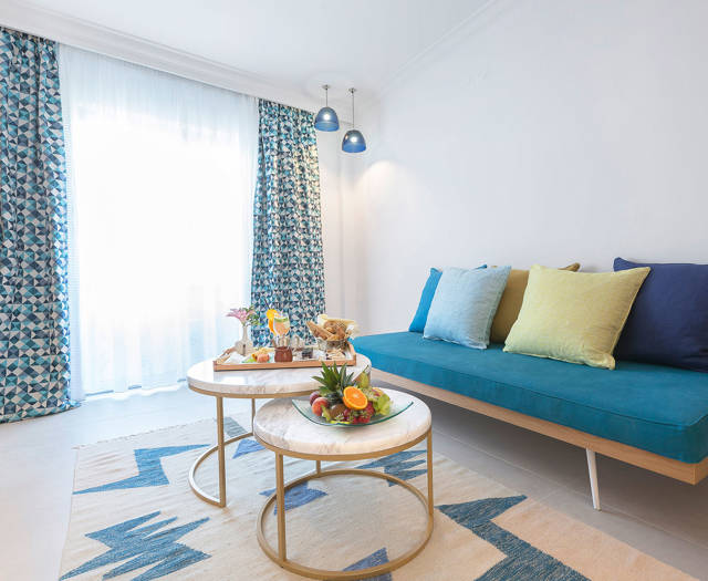 Eagles Palace Resort Chalkidiki two bedroom Suite living room in blue shades