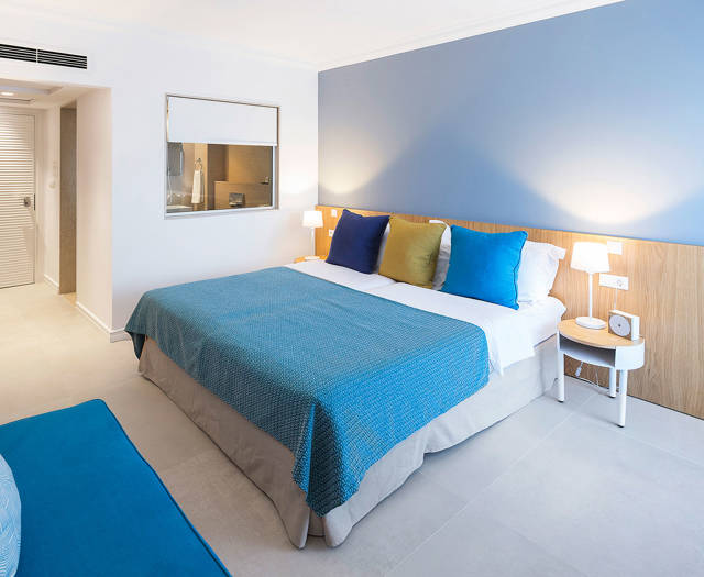 Eagles Palace Resort Chalkidiki Suite bedroom with double bed and big mirror