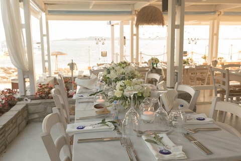 Eagles Resort Chalkidiki Wedding Events with white table seats and wine glasses