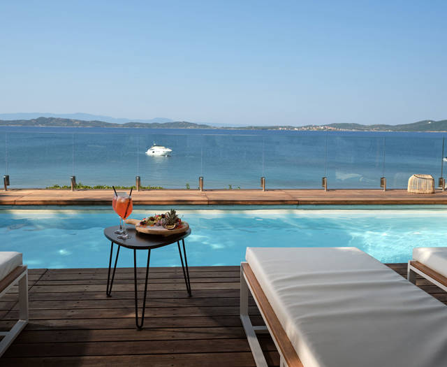 Eagles Palace Resort Chalkidiki Presidential Bungalow Sea Front Private Pool with sunbeds and table
